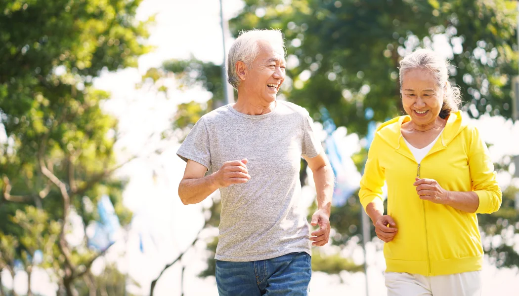 Blog Feature Image genetic predisposition healthy living Older Couple Jogs together