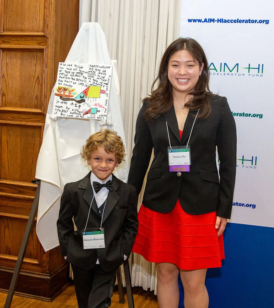 GirardIm_NFCR2022-1246 small Greyson Banovich poses with his artwork and Teen Mobile Arts Founder, Chelsea Hu