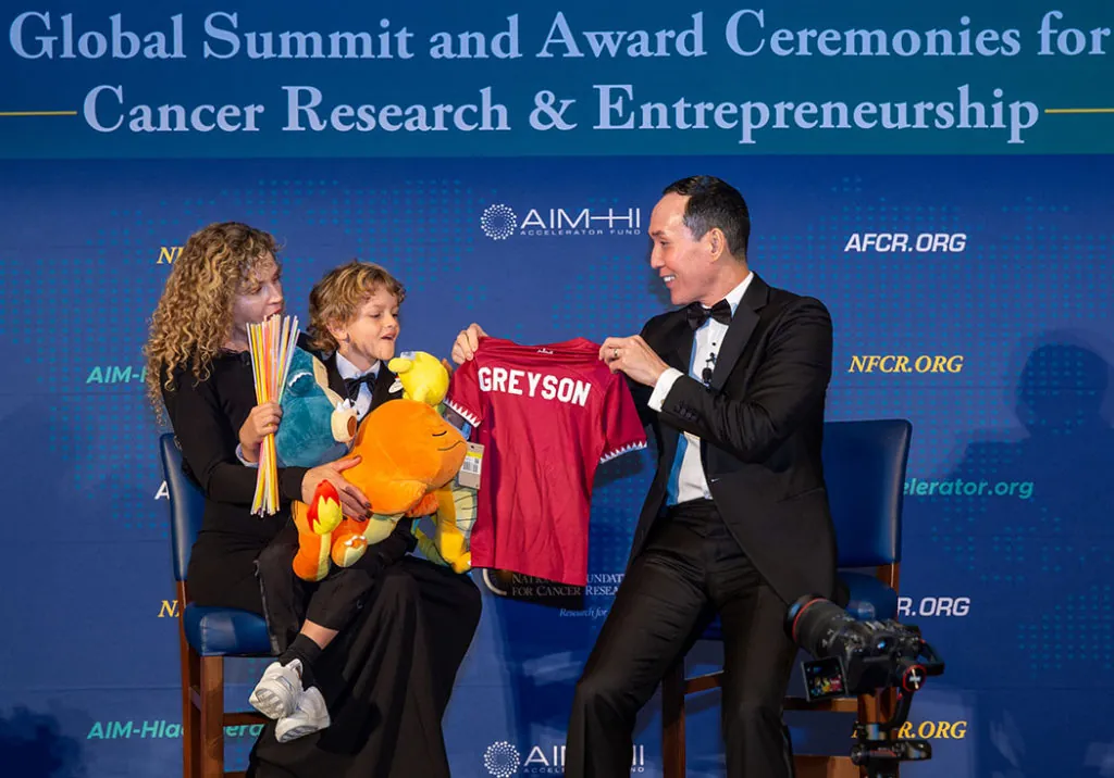 GirardIm_NFCR2022-1519 small Katie and Greyson Banovich with Lance Kawaguchi